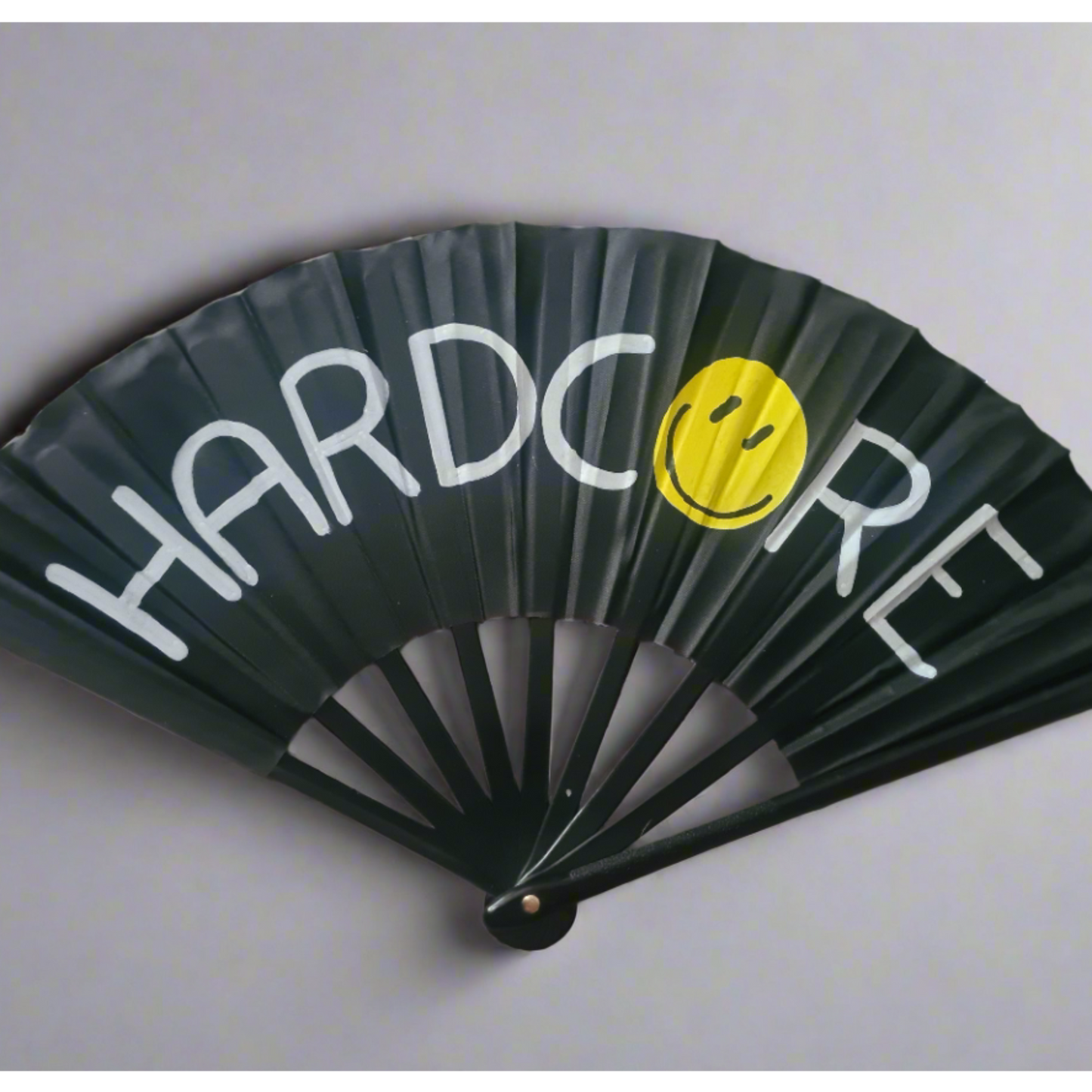 Hardcore Fan, black handpainted with white lettering, UV reactive yellow smiley, UV reactive for festivals and raves