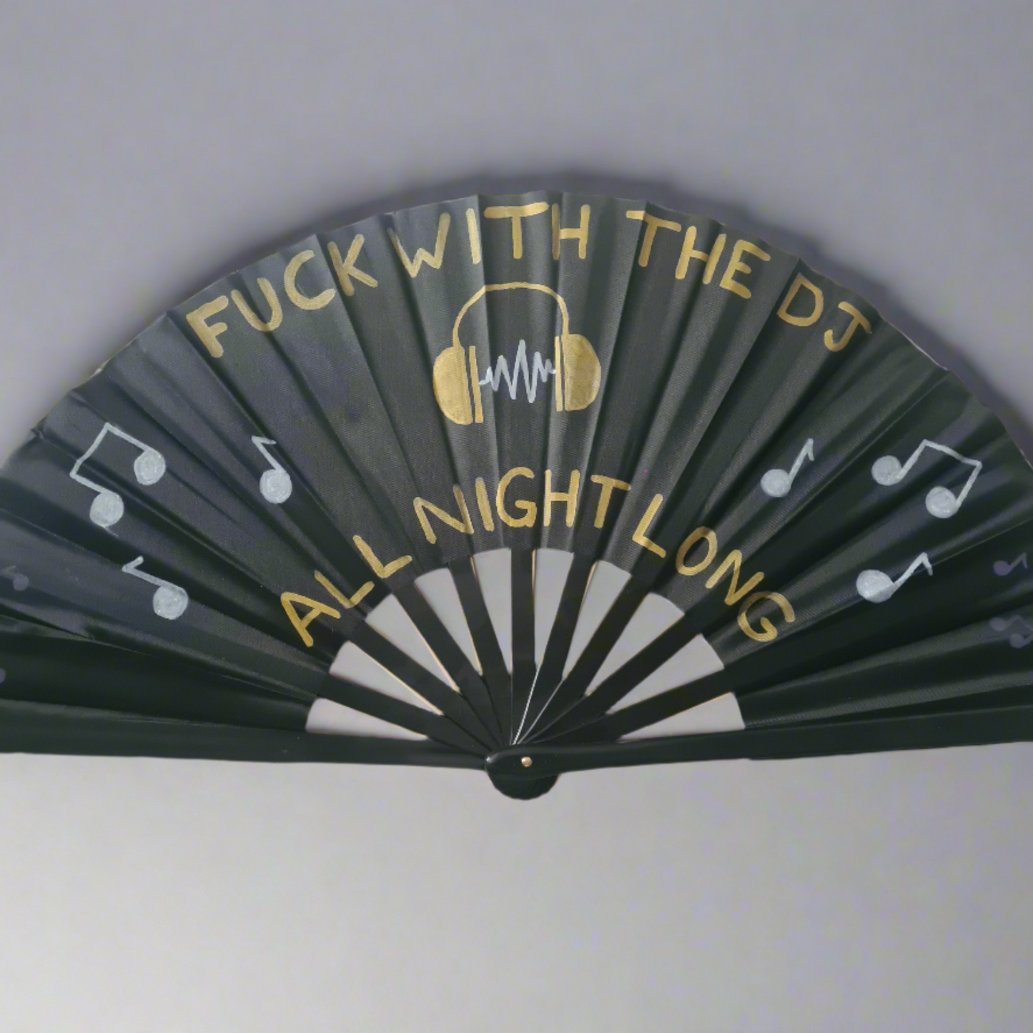 Fuck With The DJ Fan, black handpainted with gold lettering, headphones and white music notes, for festivals and raves