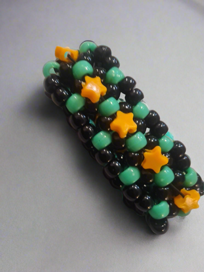 Black & Green Kandi Bracelet with Orange Stars