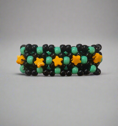 Black & Green Kandi Bracelet with Orange Stars