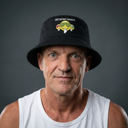 Professional portrait wearing the Secret Society bucket hat