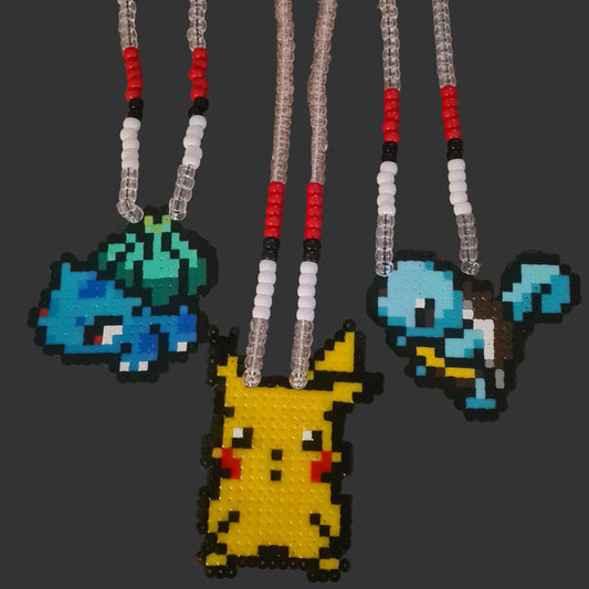 Pixelated character necklaces on a grey background