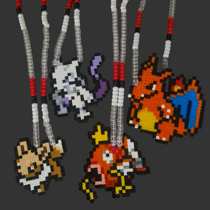 Pixelated character necklaces on gray background